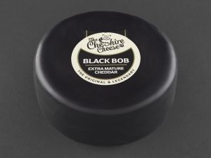 Party Time Wheel of Black Bob Extra Mature Cheddar - Waxed 2kg